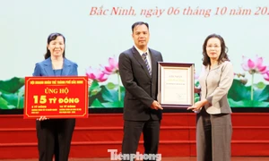 胡志明市启动2026年扶贫月 募集善款逾1650亿越盾 · 报道配图