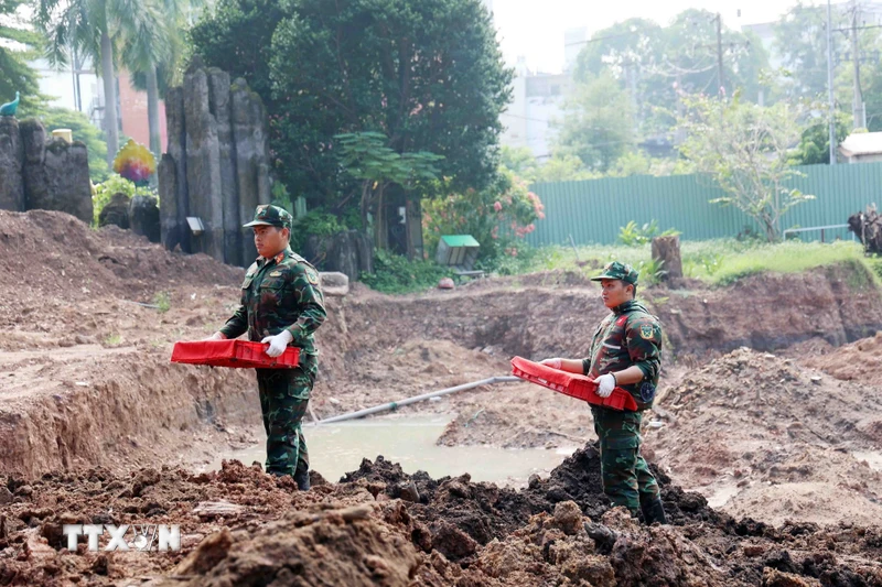 胡志明市黎氏莲公园第二阶段收迁58具烈士遗骸 · 报道配图