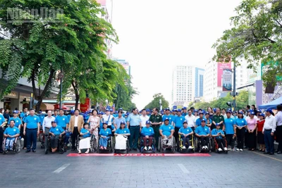 胡志明市總結五年殘疾人幫扶工作,發佈2026至2030年新計劃 · 報道配圖