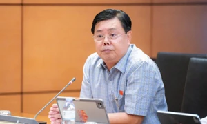 越南内务部:中央不要求各地继续统一合并乡坊 · 报道配图