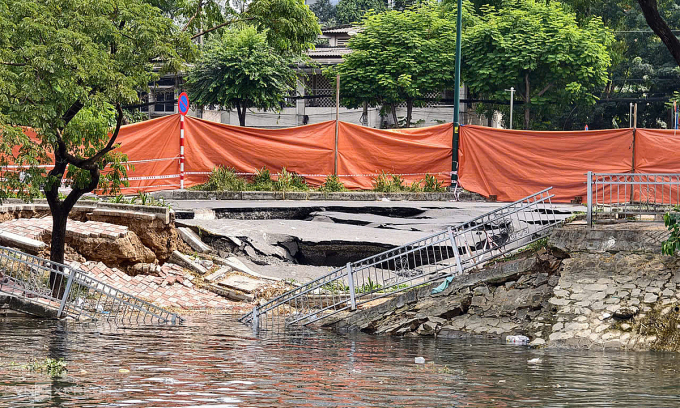 胡志明市道路断裂,滑入运河