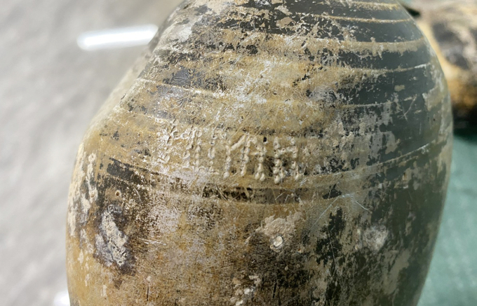 發現兩具烈士遺骸,同帶有刻字“兄”的水壺